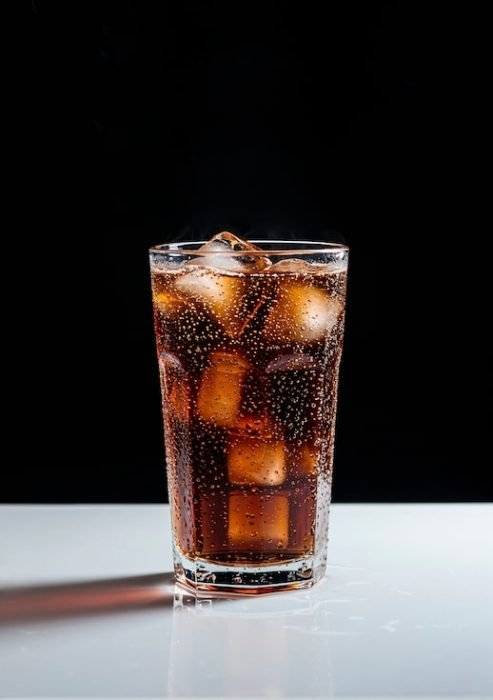 glass-cola-with-ice-cubes_23-2152002414