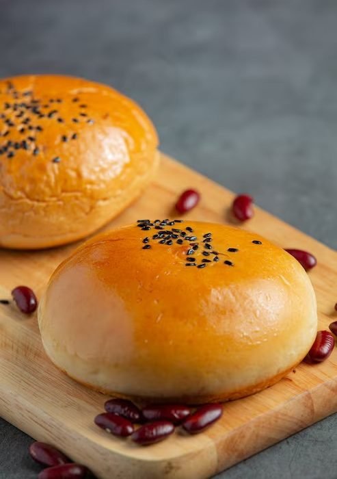 imgi_5_baked-red-bean-paste-buns-wooden-cutting-board_1150-35404